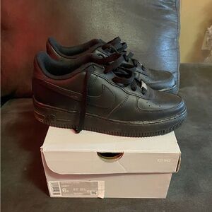 Used Nike black Air Force 1 low